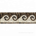 Emperador Dark Marble Polished Wave Border Corner Listello w/ Crema Marfil Dots